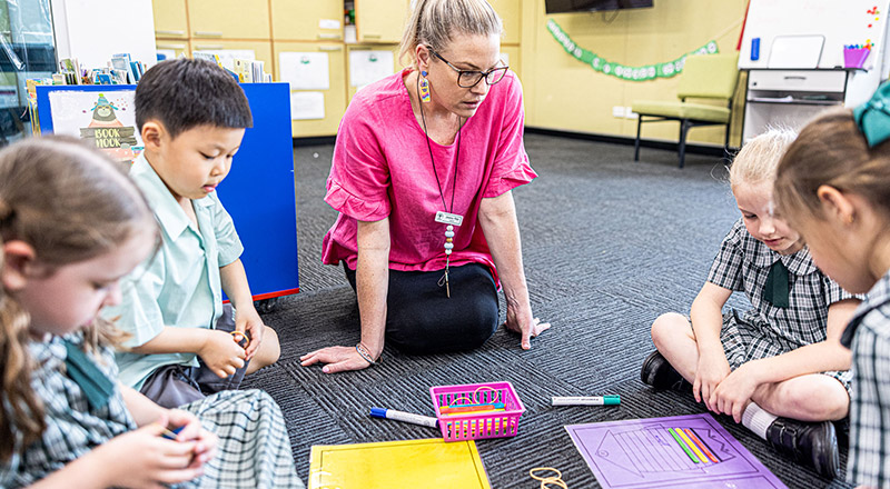 Teachers with students at Our Lady of the Way Catholic Primary Emu Plains