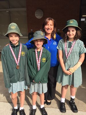 Margaret Thornton presents medals from MacKillop Cup September 2016